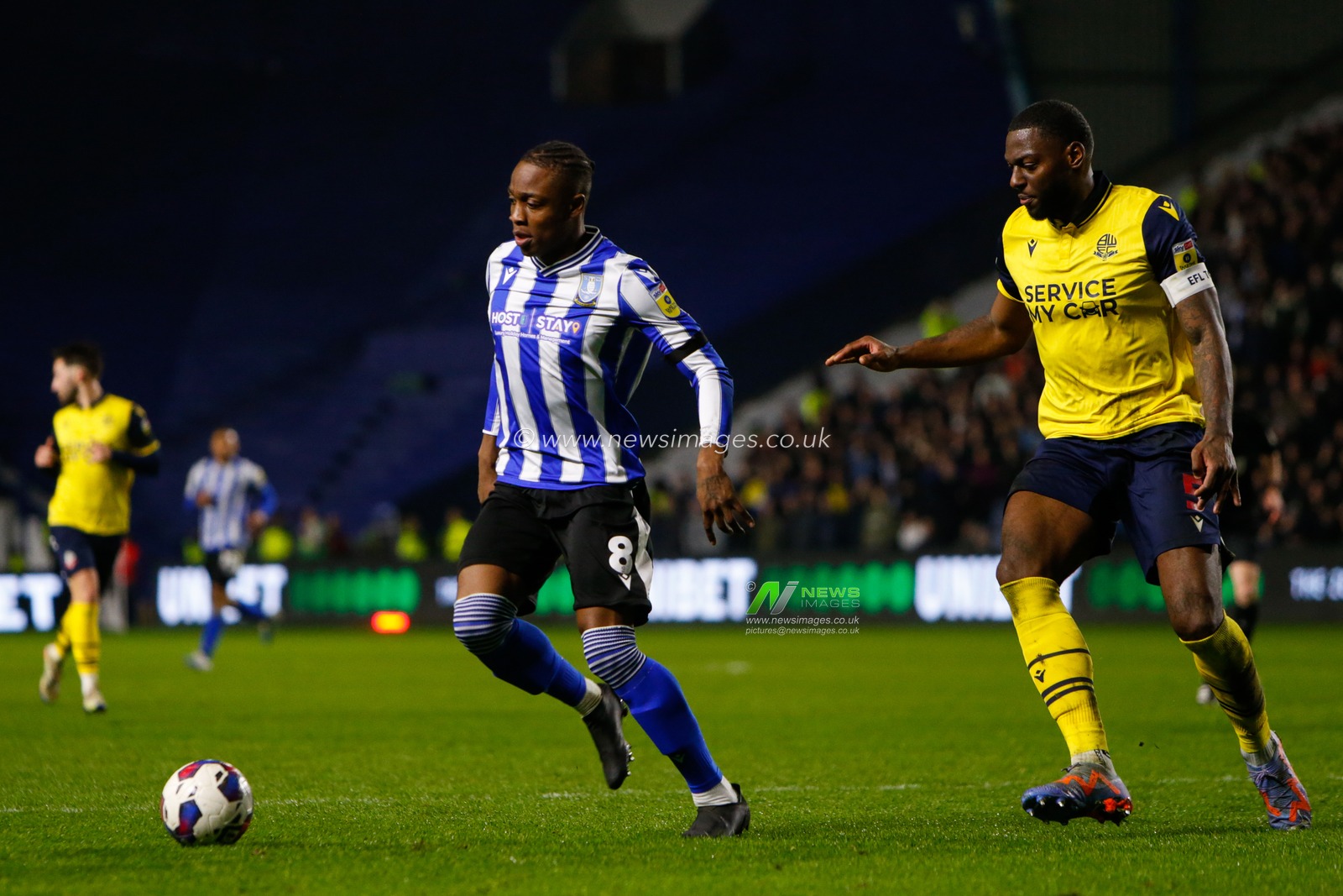 Dennis Adeniran #8 of Sheffield Wednesday and Ricardo Santos #5 of Bolton Wanderers during the Sky Bet League 1 match Sheffield Wednesday vs Bolton Wanderers at Hillsborough, Sheffield, United Kingdom, 17th March 2023

(Photo by Ben Early/News Images)