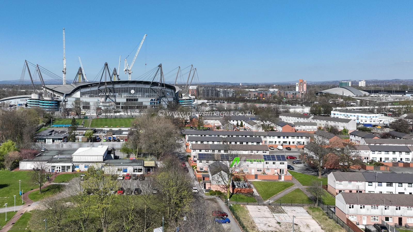 An aerial view of the Etihad Stadium from a local housing estate during the Premier League match Manchester City vs Leicester City at Etihad Stadium, Manchester, United Kingdom, 2nd April 2025

(Photo by Mark Cosgrove/News Images)