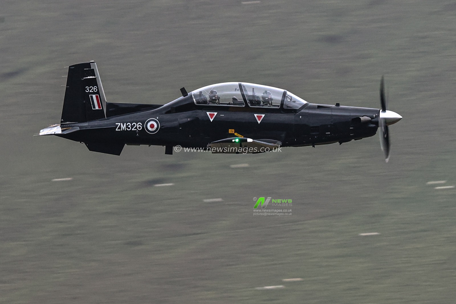 An RAF Texan T1 flies through the Mach Loop, Dolgellau, United Kingdom, 2nd October 2025

(Photo by Alfie Cosgrove/News Images)