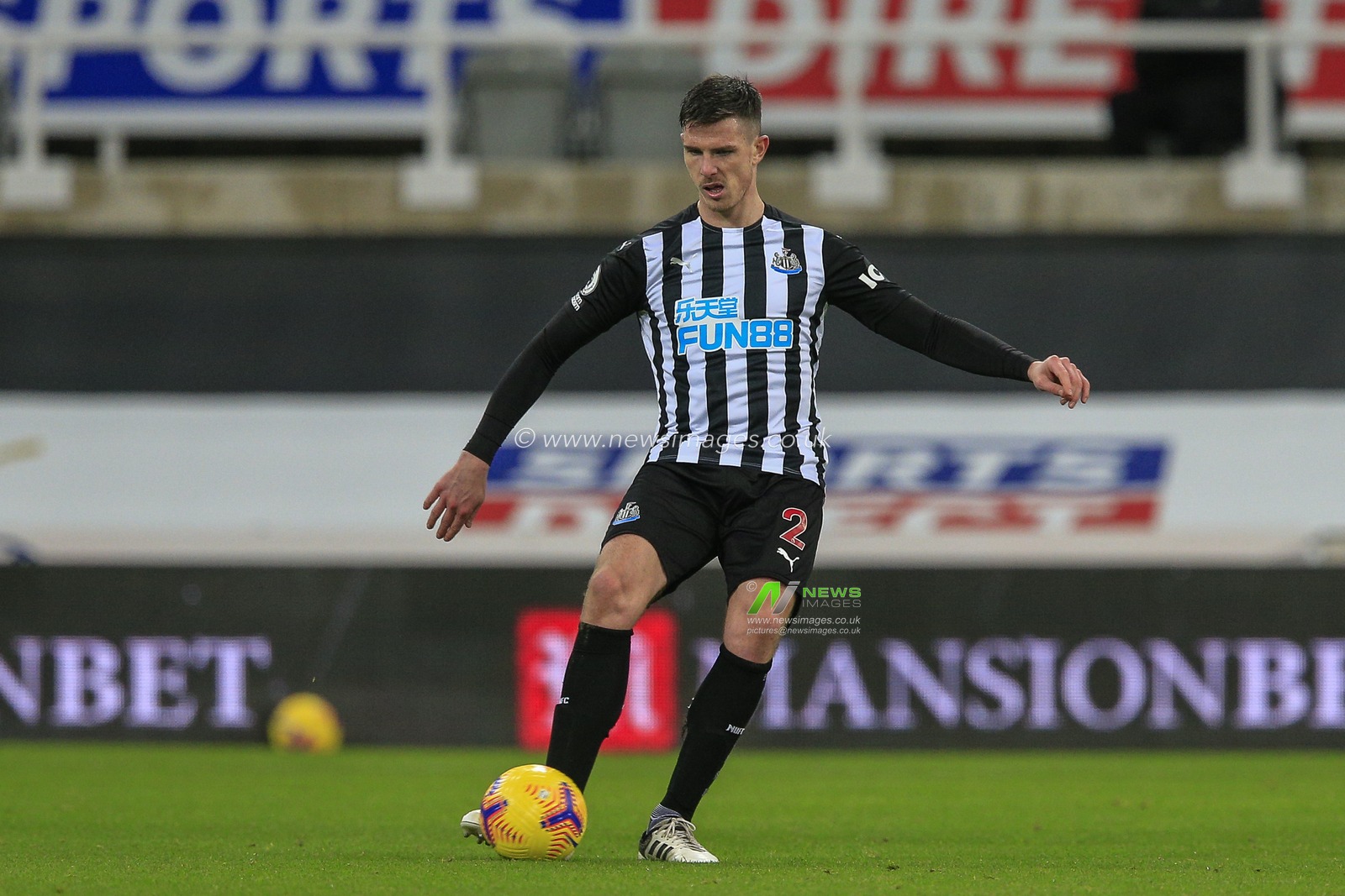 Ciaran Clark #2 of Newcastle United with the ball