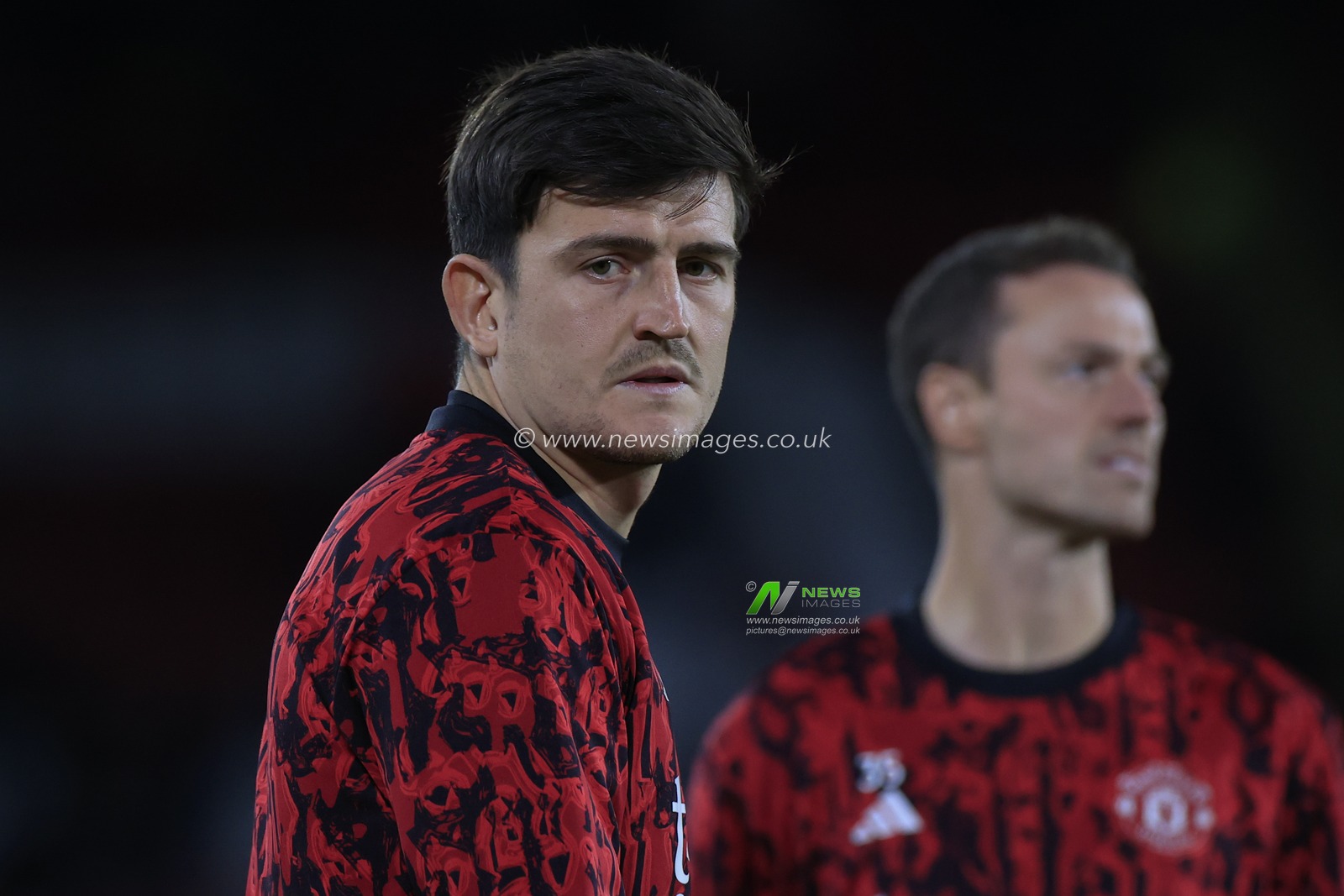 Harry Maguire #5 of Manchester United warms up for the game ahead of the Premier League match Sheffield United vs Manchester United at Bramall Lane, Sheffield, United Kingdom, 21st October 2023

(Photo by Conor Molloy/News Images)