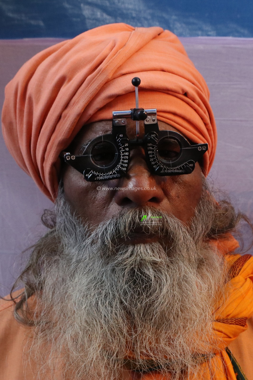 A doctor examines the eye of a Sadhu or Holy Man at a free eye camp at a Gangasagar mela transit camp in Kolkata,India on January 11,2025.Picture by Debajyoti Chakraborty.(Photo: Debajyoti Chakraborty/News Images)