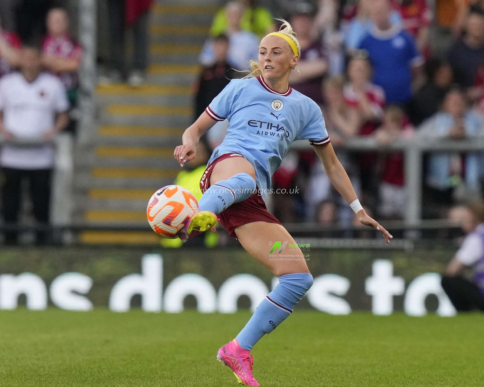 Chloe Kelly #9 of Manchester City flicks the ball on during the The FA Women's Super League match Manchester United Women vs Manchester City Women at Leigh Sports Village, Leigh, United Kingdom, 21st May 2023

(Photo by Steve Flynn/News Images)