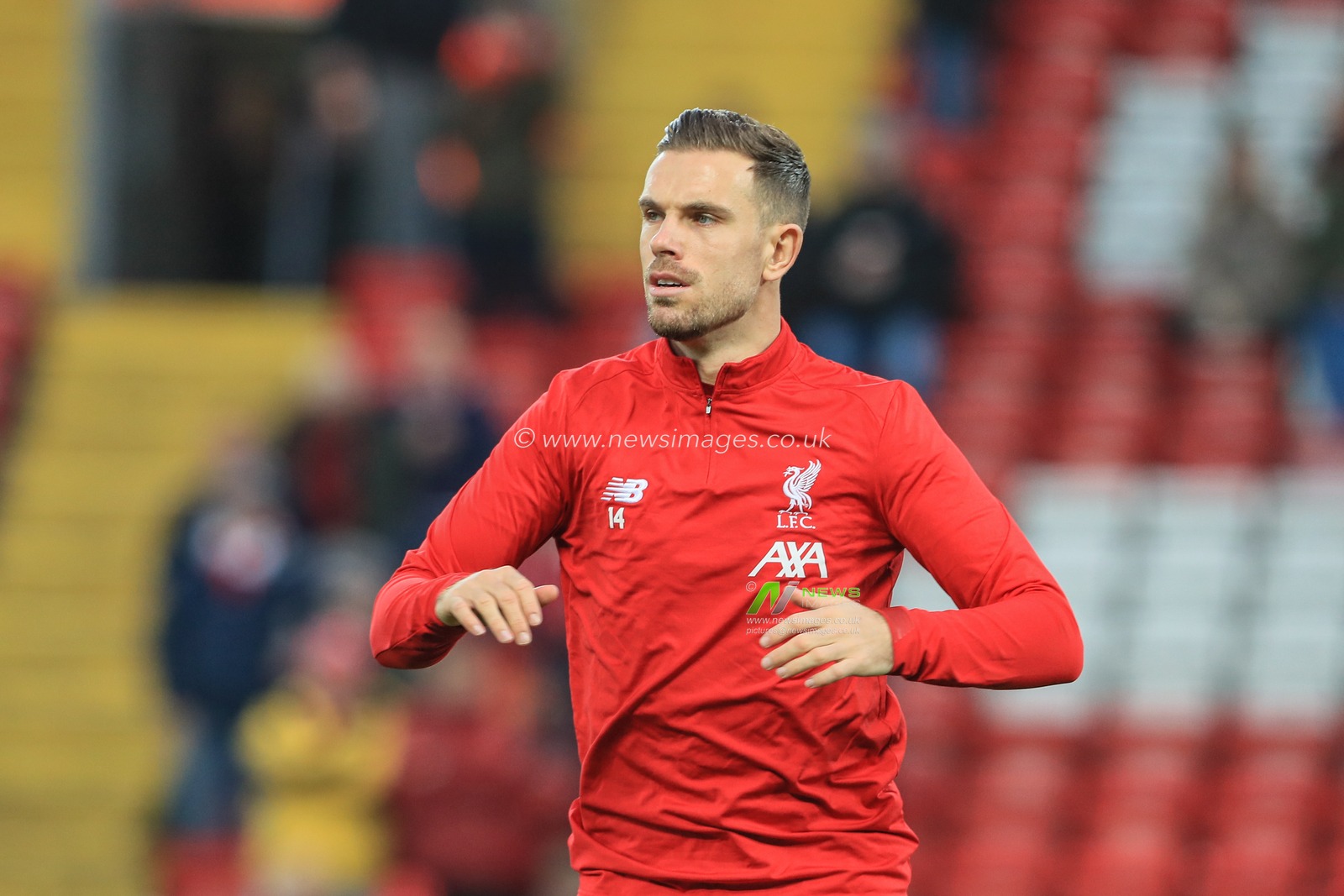 29th December 2019, Anfield, Liverpool, England; Premier League, Liverpool v Wolverhampton Wanderers : Jordan Henderson (14) of Liverpool during the pre-game warmup 

Credit: Mark Cosgrove/News Images