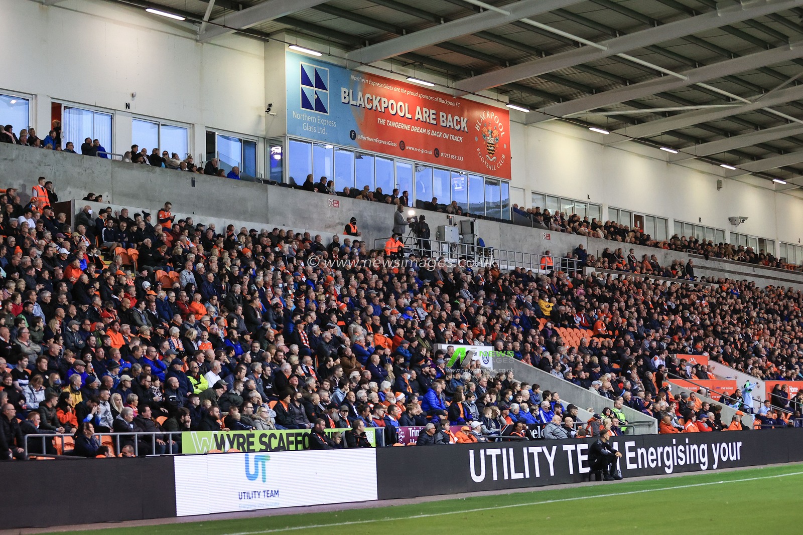 Scenes from the game with advertising boards