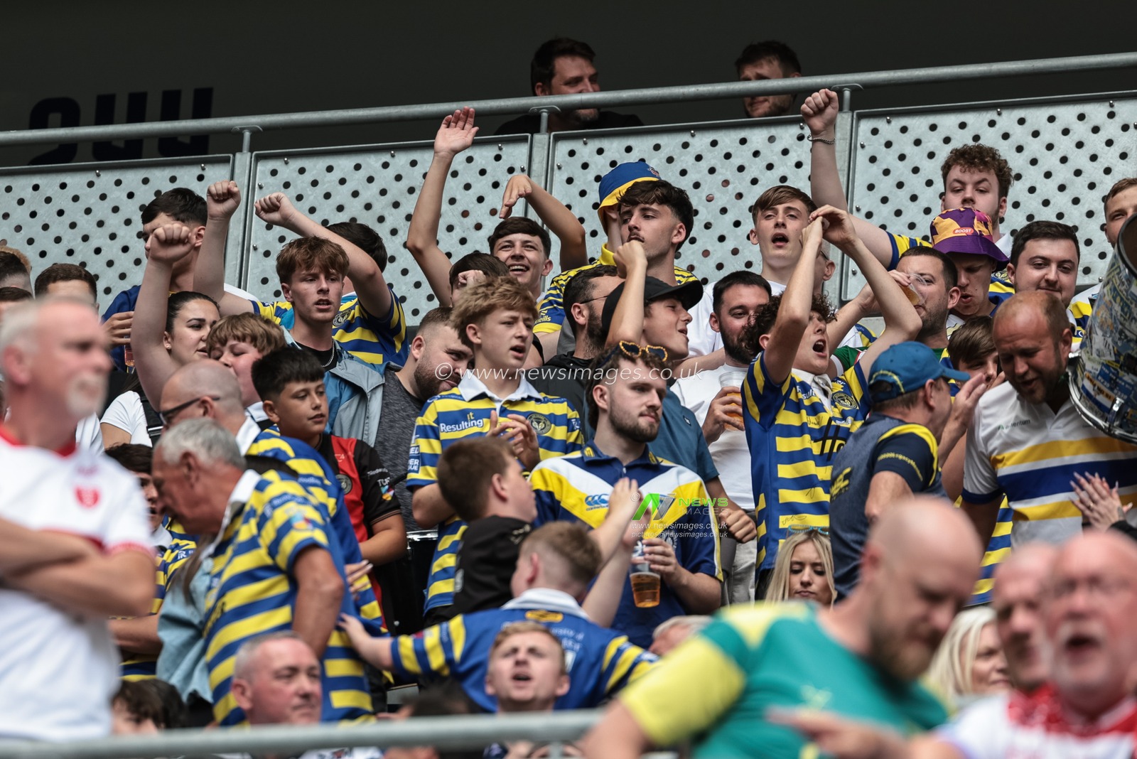 Warrington fans sing and dance during the Betfred Super League Magic Weekend match Leigh Leopards vs Warrington Wolves at Hill Dickinson Stadium, Liverpool, United Kingdom on 04 July 2026

(Photo by Mark Cosgrove/News Images)
