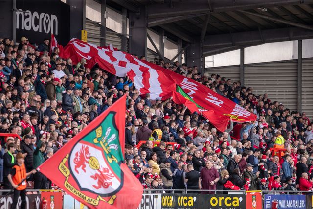 Wrexham fans during the Sky Bet League 1 match Wrexham vs Stockport County at SToK Cae Ras, Wrexham, United Kingdom, 22nd March 2025

(Photo by Nik Mesney/News Images)