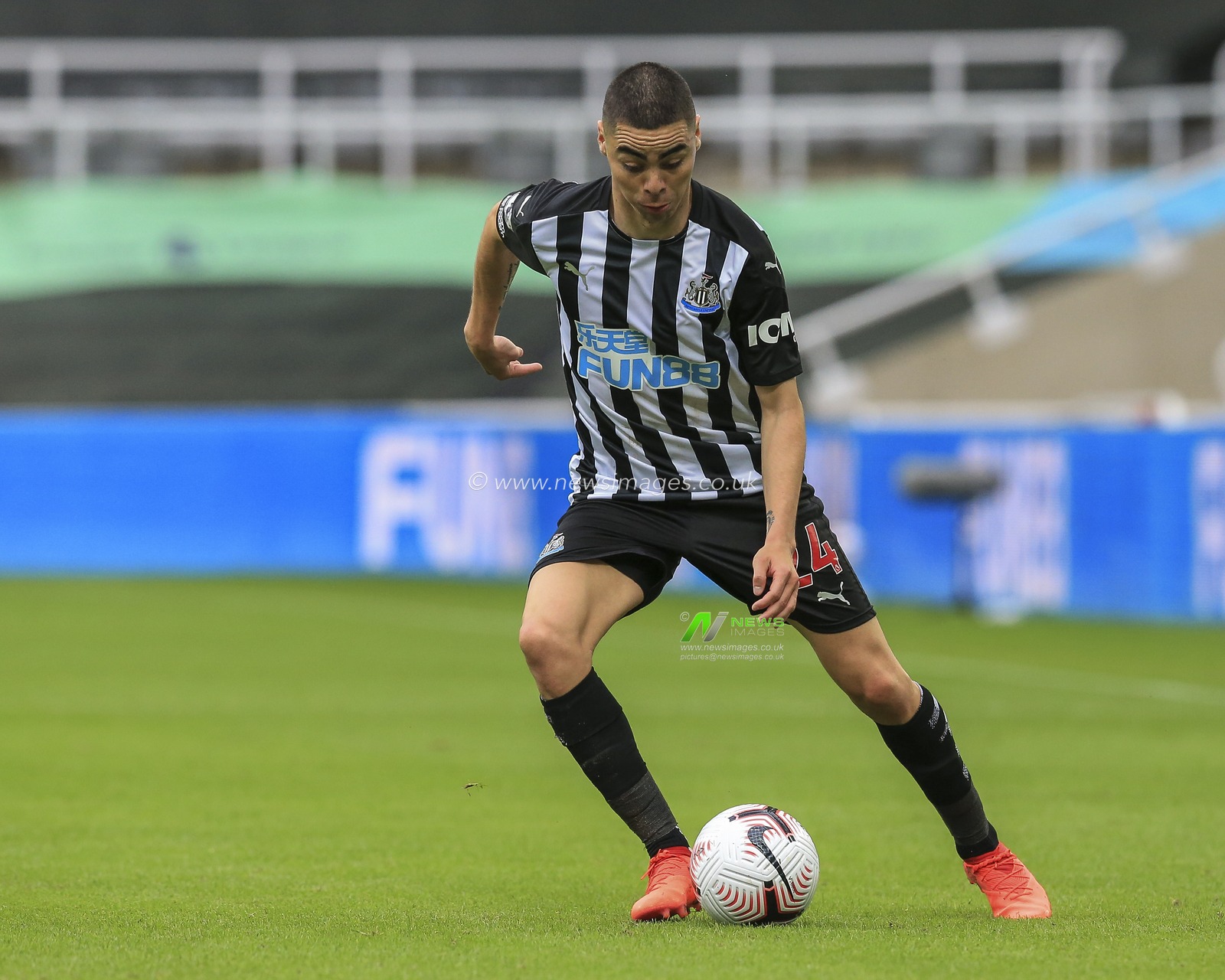 Miguel AlmirÃ³n (24) of Newcastle United in action