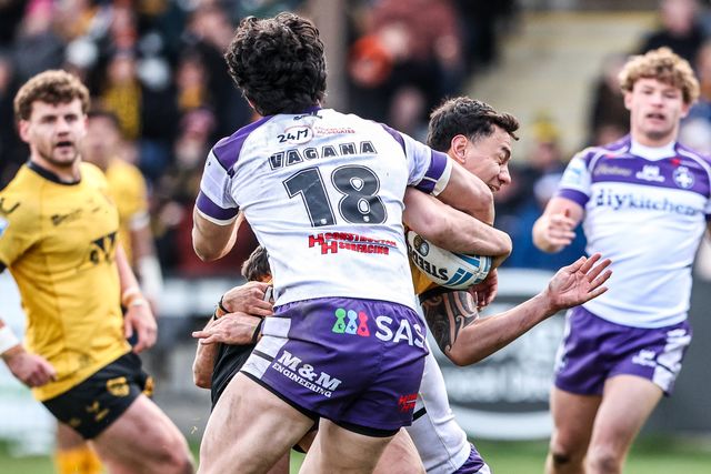 Daejarn Asi of Castleford Tigers is tackled by Isaiah Vagana of Wakefield Trinity during the Betfred Super League round 7 match Castleford Tigers vs Wakefield Trinity at OneBore Stadium, Castleford, Untied Kingdom on 05 April 2026

(Photo by Alfie Cosgrove/News Images)