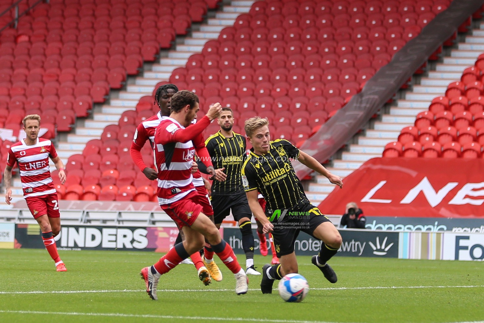 Jon Taylor (11) of Doncaster Rovers scores to make it 4-1