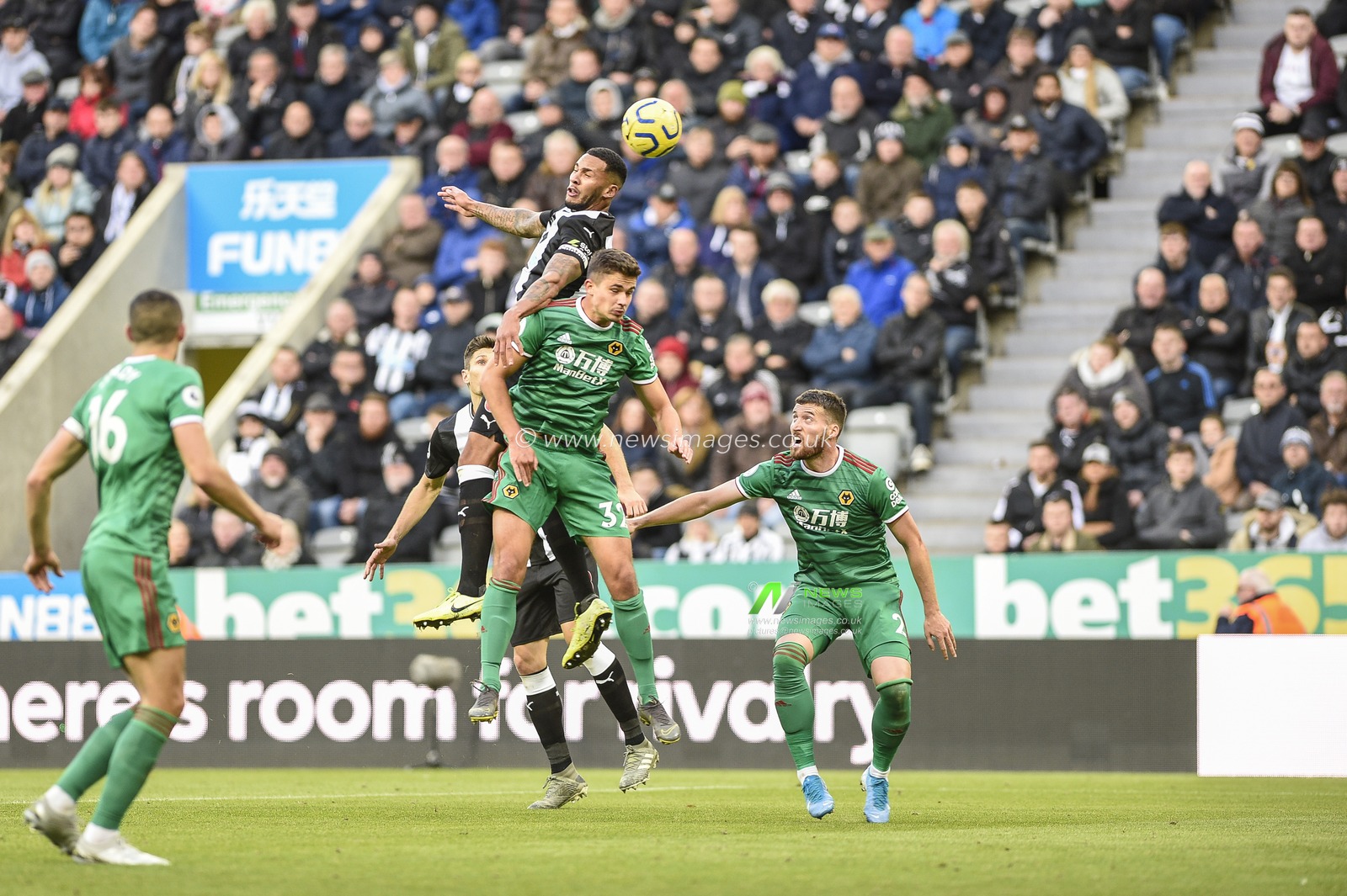 27th October 2019, St. James's Park, Newcastle, England; Premier League, Newcastle United v Wolverhampton Wanderers : Jamaal Lascelles, captain of Newcastle United, heads the ball towards the Wolverhampton Wanderers' goal

Credit: Iam Burn/News Images