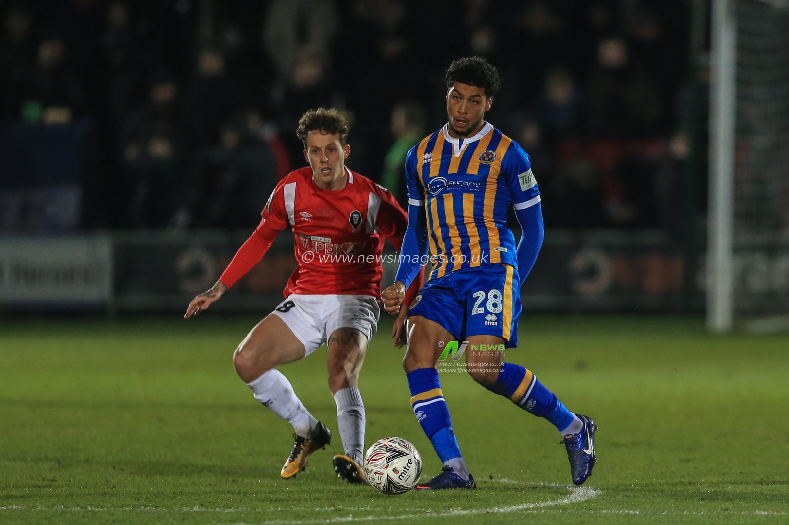 21st November 2018, Moor Lane, Salford, England; The Emirates FA Cup, Round 1, Salford City v Shrewsbury Town ; Josh Laurent of Shrewsbury Town passes the ball as Danny Whitehead of Salford City pressures

Credit: Mark Cosgrove/News Images

English Football League images are subject to DataCo Licence