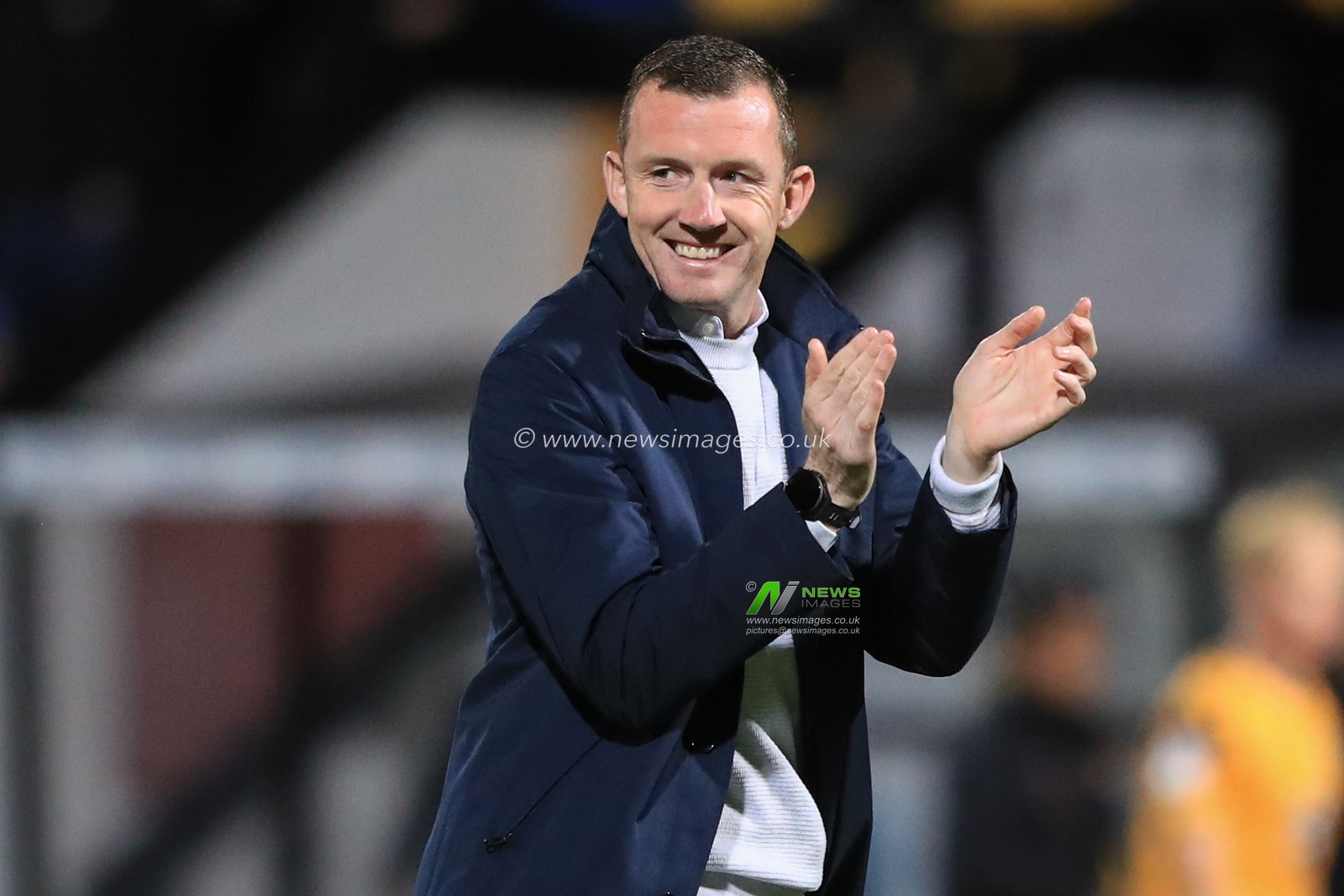 Neill Collins Head coach of Barnsley applauds the travelling fans after Barnsley win 0-4 during the Sky Bet League 1 match Cambridge United vs Barnsley at Abbey Stadium, Cambridge, United Kingdom, 3rd October 2023

(Photo by Alfie Cosgrove/News Images)