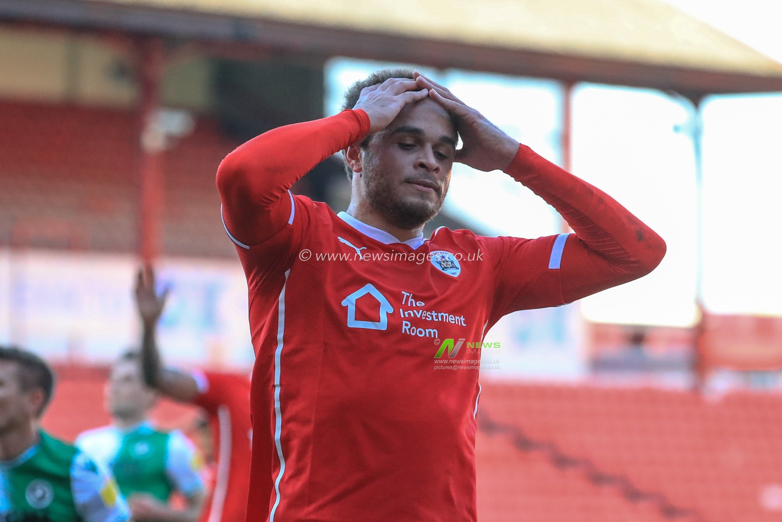 Carlton Morris #14 of Barnsley reacts as his shot is saved by Bartosz BiaÅ‚kowski #33 of Millwall