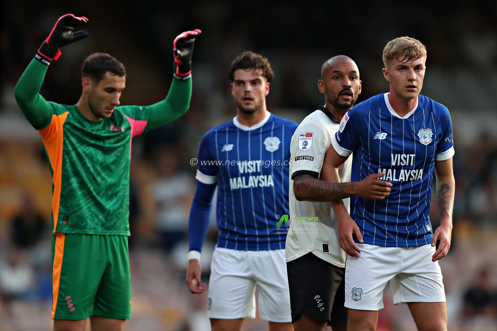 Funso Ojo of Port Vale F.C. marks Joel Bagan of Cardiff City F.C. during the Sky Bet League 1 match Port Vale vs Cardiff City at Vale Park, Burslem, United Kingdom, 7th August 2025(Photo by Sam Eaden/News Images)