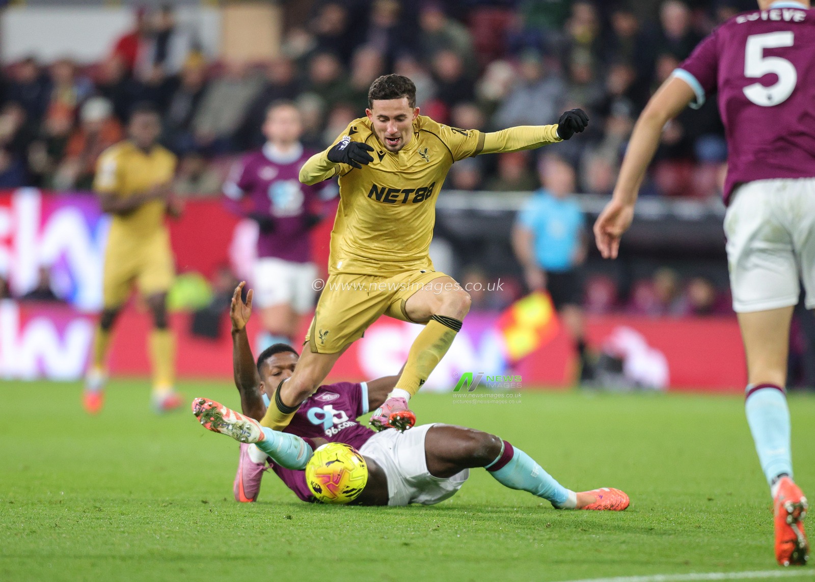 Florentino Luis of Burnley slides in on Yeremi Pino of Crystal Palace during the Premier League match Burnley vs Crystal Palace at Turf Moor, Burnley, United Kingdom, 3rd December 2025

(Photo by Richard Bierton/News Images)

*** GER AUT SUI OUT ***