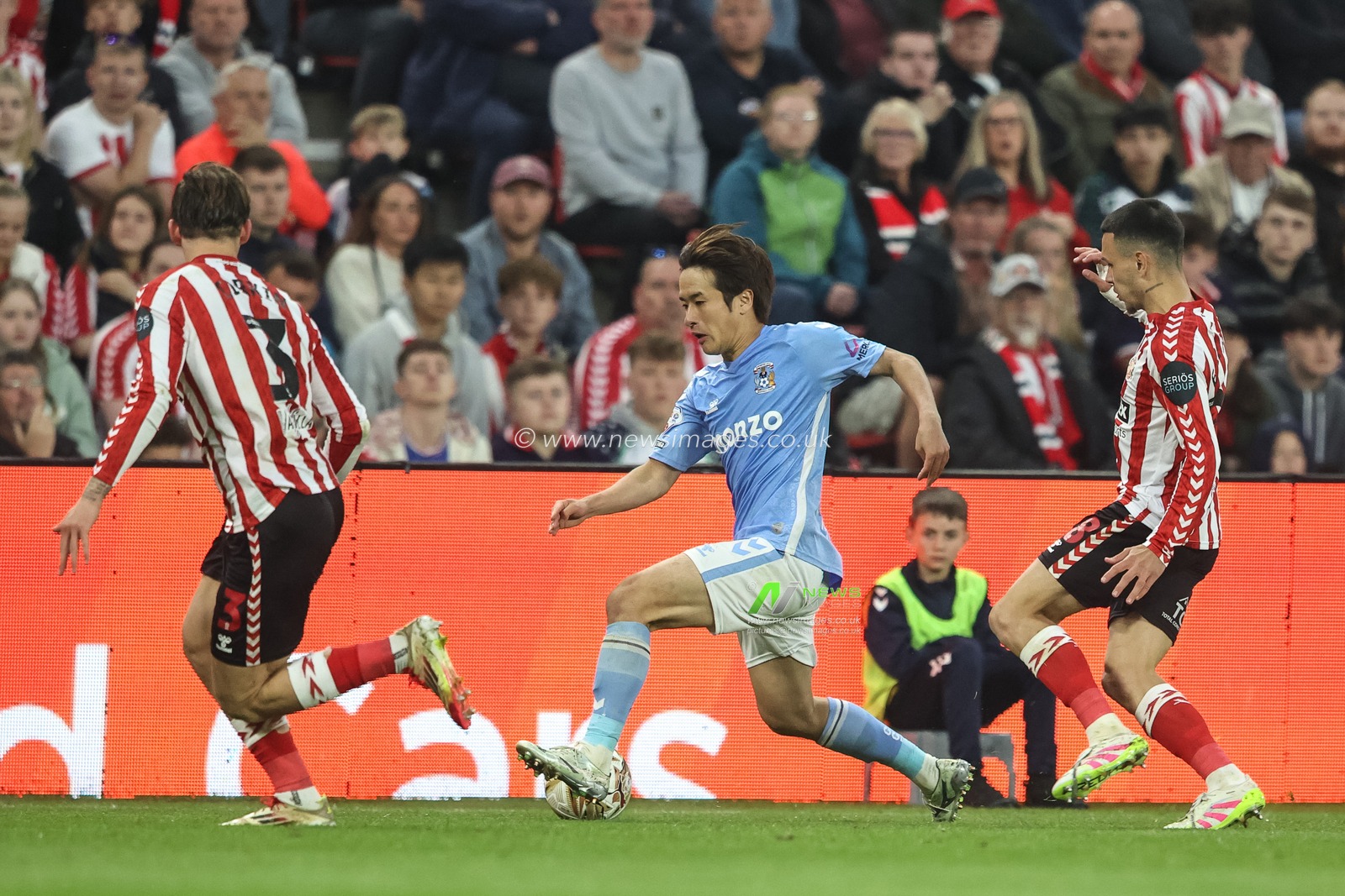Tatsuhiro Sakamoto of Coventry City breaks with the ball during the Sky Bet Championship Playoff Semi-final match Sunderland vs Coventry City at Stadium Of Light, Sunderland, United Kingdom, 13th May 2025

(Photo by Alfie Cosgrove/News Images)