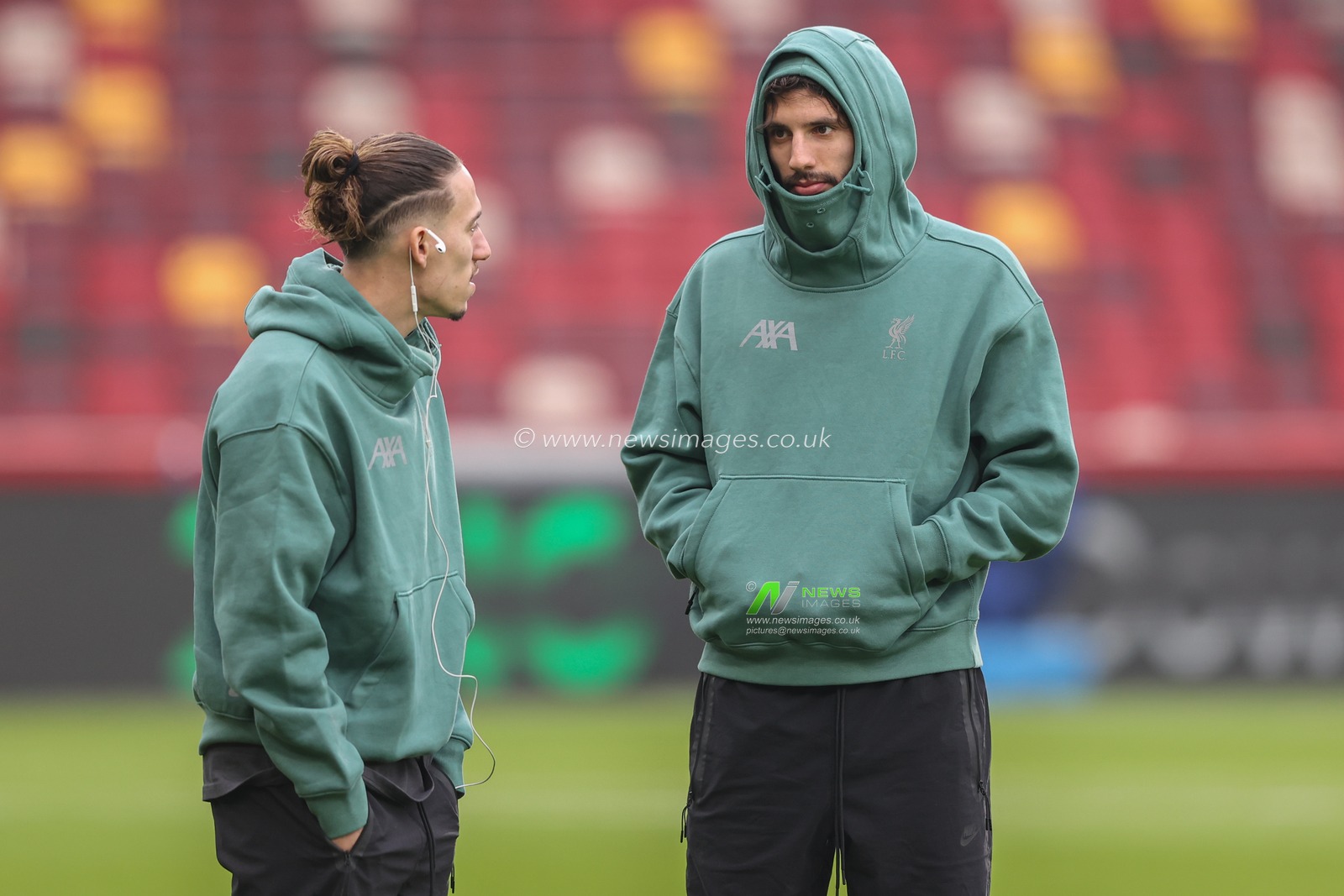 Dominik Szoboszlai of Liverpool and Kostas Tsimikas of Liverpool arrive during the Premier League match Brentford vs Liverpool at The Gtech Community Stadium, London, United Kingdom, 18th January 2025

(Photo by Alfie Cosgrove/News Images)