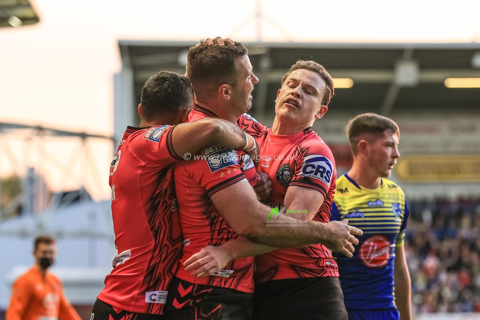Iain Thornley #4 of Wigan Warriors celebrates his second try