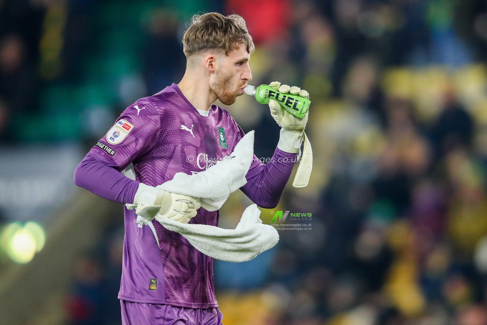 Dan Grimshaw of Plymouth Argyle drinks FUEL during the Sky Bet Championship match Norwich City vs Plymouth Argyle at Carrow Road, Norwich, United Kingdom, 26th November 2024

(Photo by Izzy Poles/News Images)