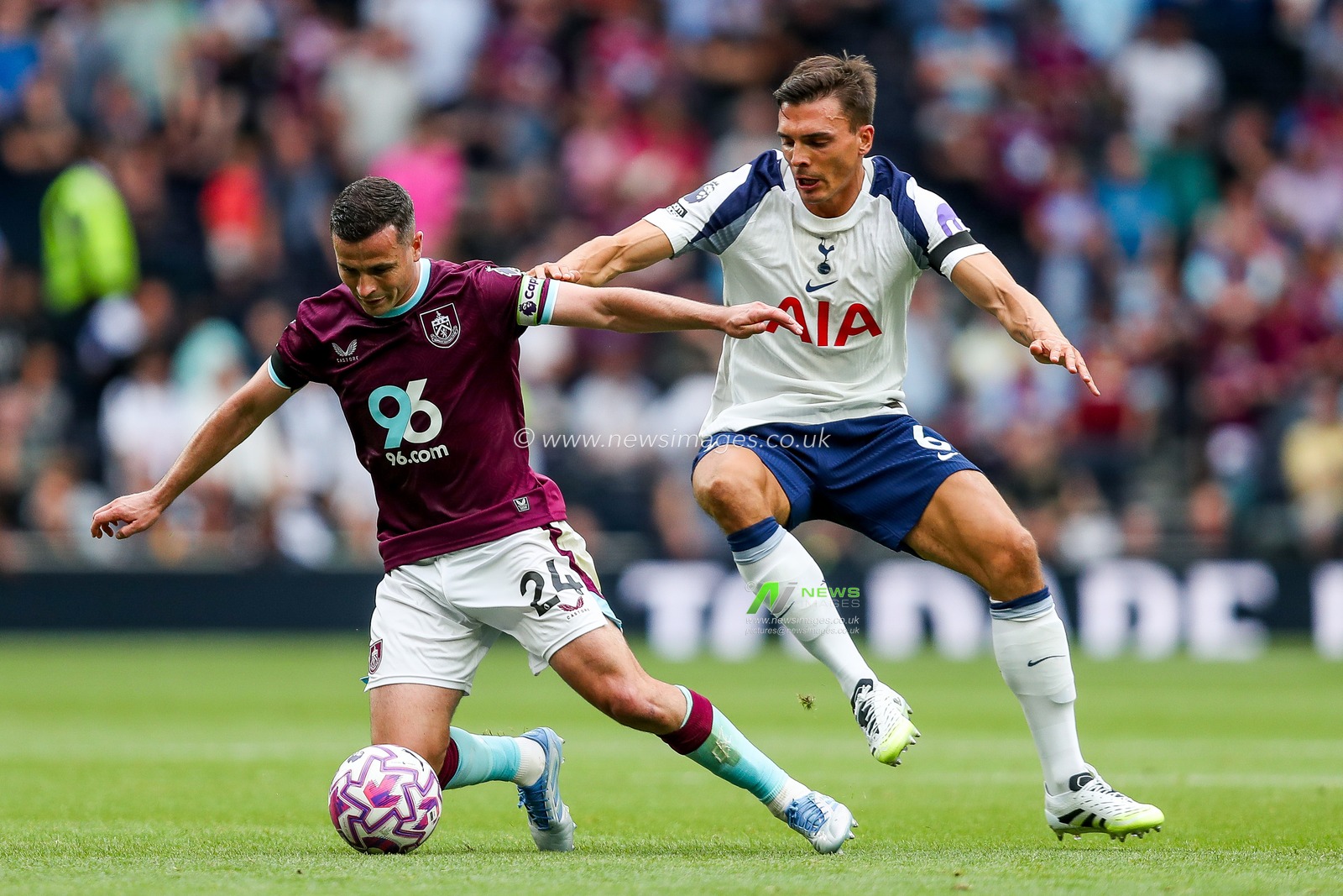 Josh Cullen of Burnley is put under pressure by Joao Palhinha of Tottenham Hotspur during the Premier League match Tottenham Hotspur vs Burnley at Tottenham Hotspur Stadium, London, United Kingdom, 16th August 2025

(Photo by Izzy Poles/News Images)