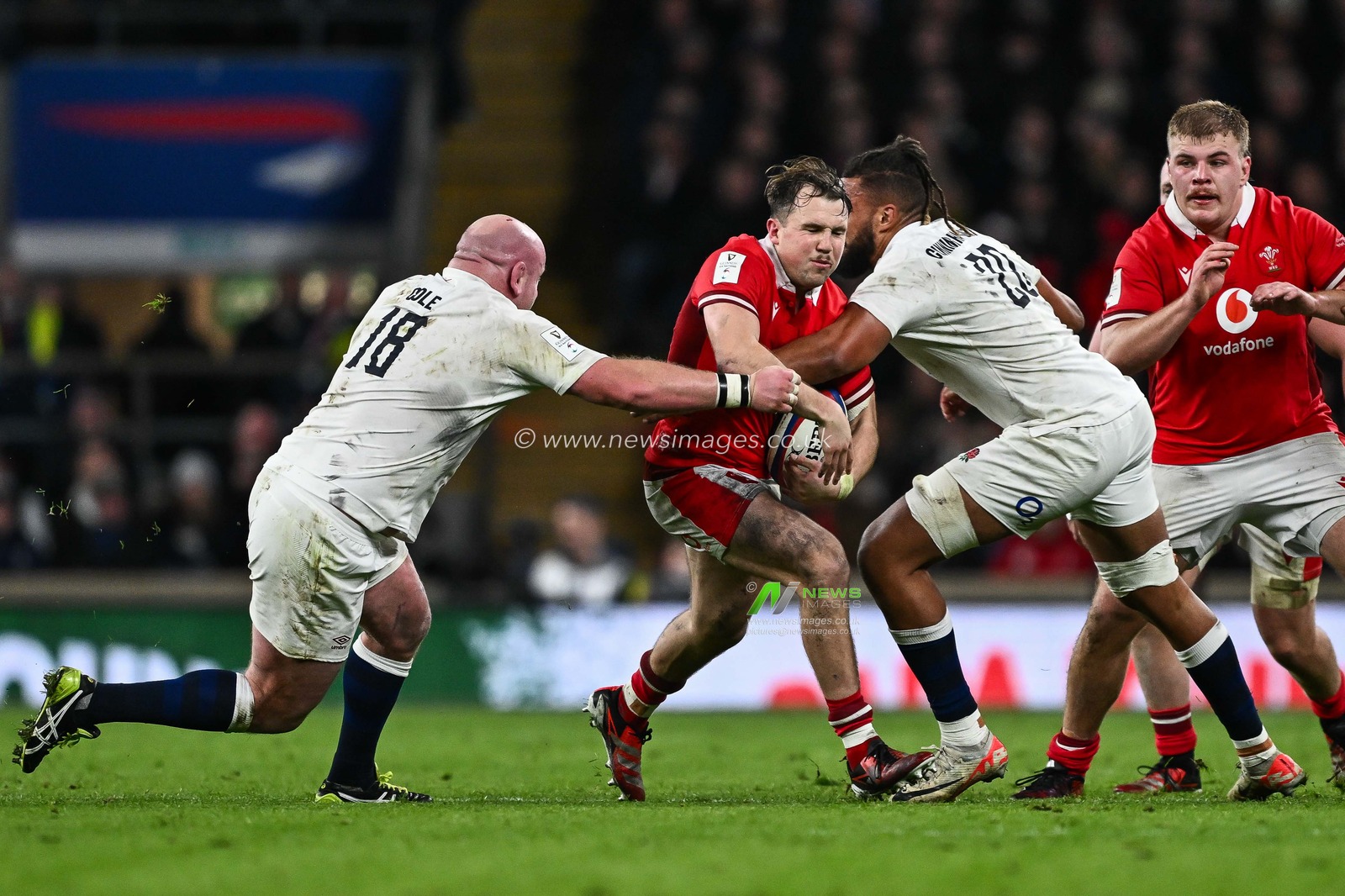 Ioan Lloyd of Wales is tackled by Chandler Cunningham-South of England and Dan Cole of England during the 2024 Guinness 6 Nations match England vs Wales at Twickenham Stadium, Twickenham, United Kingdom, 10th February 2024

(Photo by Craig Thomas/News Images)