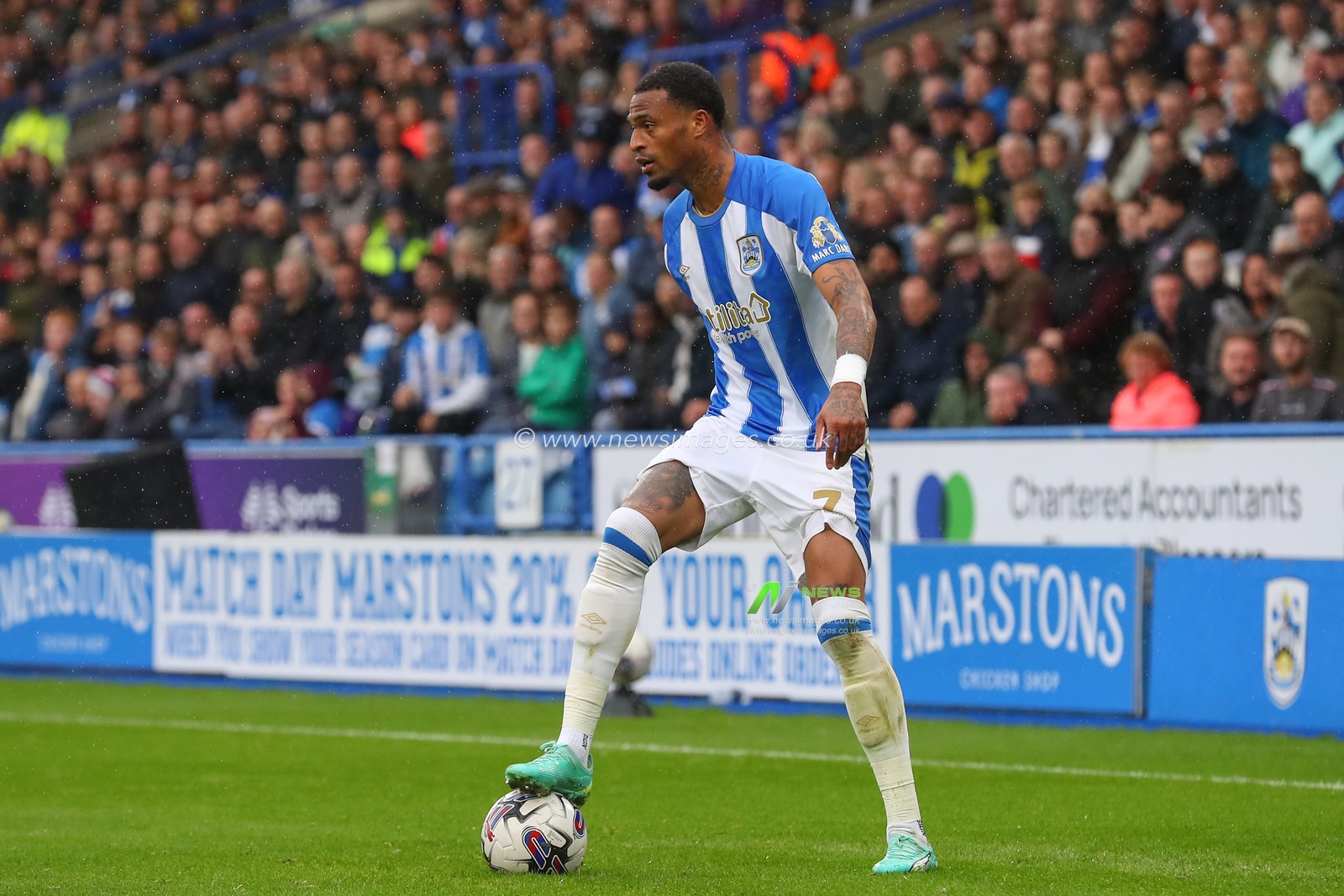 Delano Burgzorg #7 of Huddersfield Town in action during the Sky Bet Championship match Huddersfield Town vs Ipswich Town at John Smith's Stadium, Huddersfield, United Kingdom, 30th September 2023

(Photo by Gareth Evans/News Images)