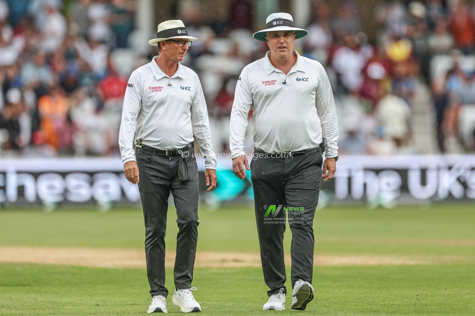 on-field umpire Rod Tucker and on-field umpire Nitin Menon walk off as rain stops play during the Rothesay Test Match day three England vs West Indies at Trent Bridge, Nottingham, United Kingdom, 20th July 2024

(Photo by Mark Cosgrove/News Images)