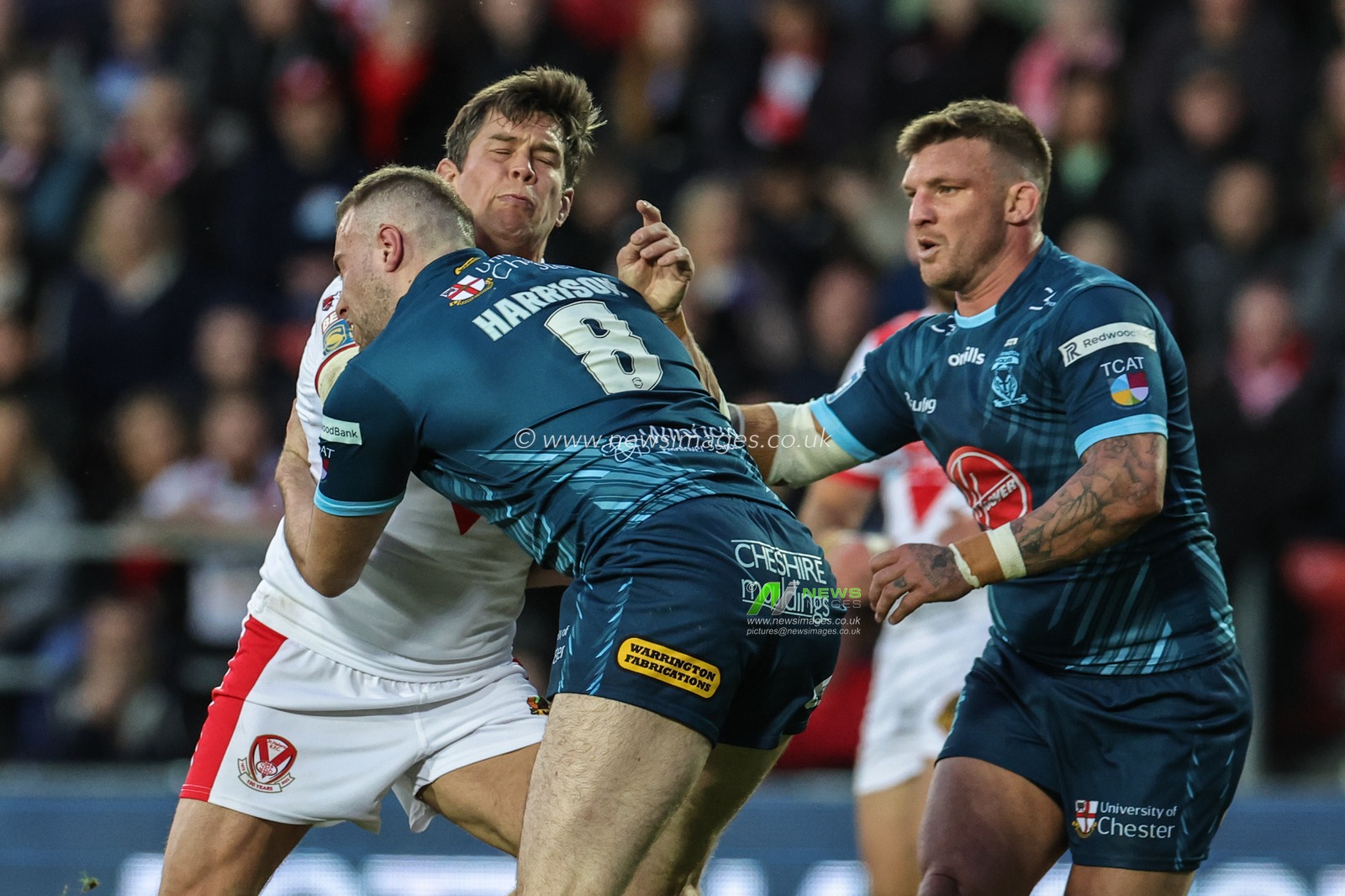 Louie McCarthy-Scarsbrook #15 of St Helens is tackled by James Harrison #8 of Warrington Wolves during the Betfred Super League Round 10 match St Helens vs Warrington Wolves at Totally Wicked Stadium, St Helens, United Kingdom, 20th April 2023

(Photo by Mark Cosgrove/News Images)