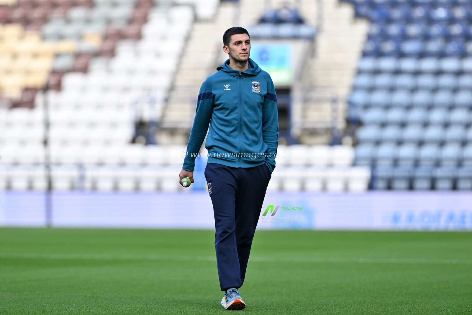 Liam Kitching of Coventry City inspects the pitch ahead of the Sky Bet Championship match Preston North End vs Coventry City at Deepdale, Preston, United Kingdom, 19th October 2024

(Photo by Cody Froggatt/News Images)