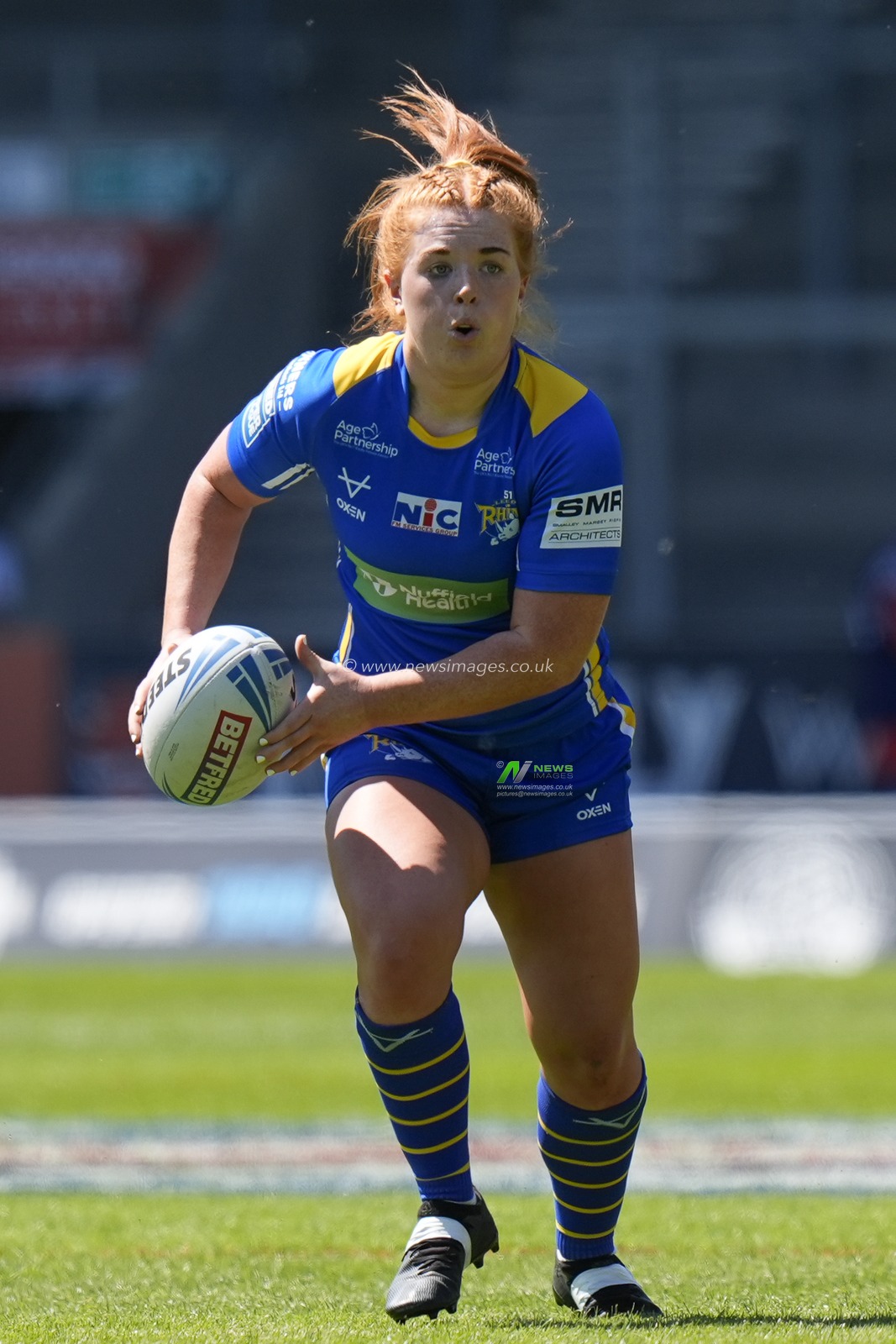 Caitlin Casey of Leeds Rhinos runs with the ball during the Betfred Women's Challenge Cup Semi-Final match Leeds Rhinos vs Wigan Warriors at Totally Wicked Stadium, St Helens, United Kingdom, 19th May 2024

(Photo by Steve Flynn/News Images)