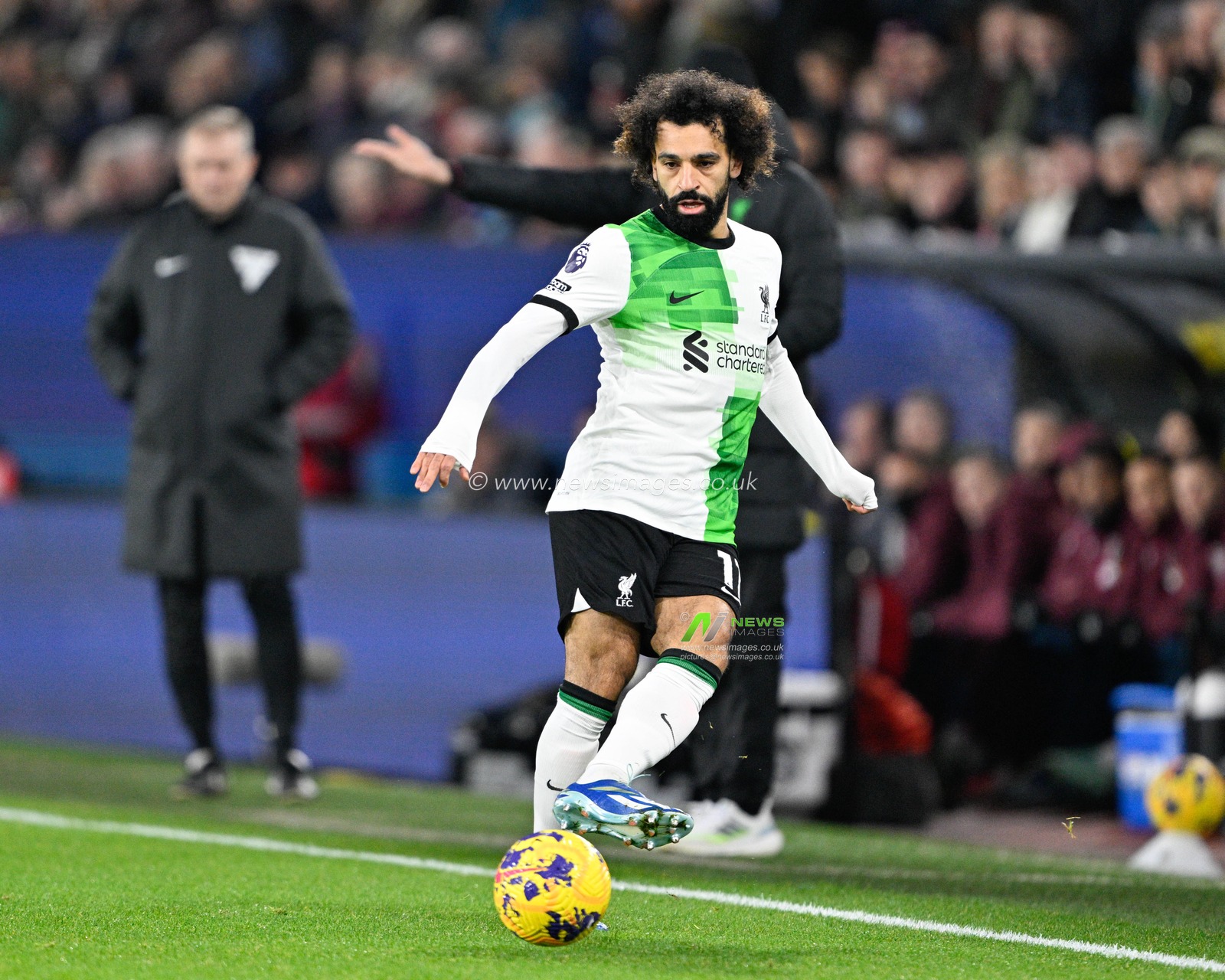 Mohamed Salah 11# of Liverpool Football Club passes the ball, during the Premier League match Burnley vs Liverpool at Turf Moor, Burnley, United Kingdom, 26th December 2023

(Photo by Cody Froggatt/News Images)
