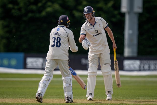 Zak Chappell fist pumps Mohammad Abbas  during the County Championship Division Two Derbyshire v Gloucestershire at The Central Co-Op County Ground, Derby, United Kingdom on 26 April 2026

(Photo by Maynard Manyowa/News Images)