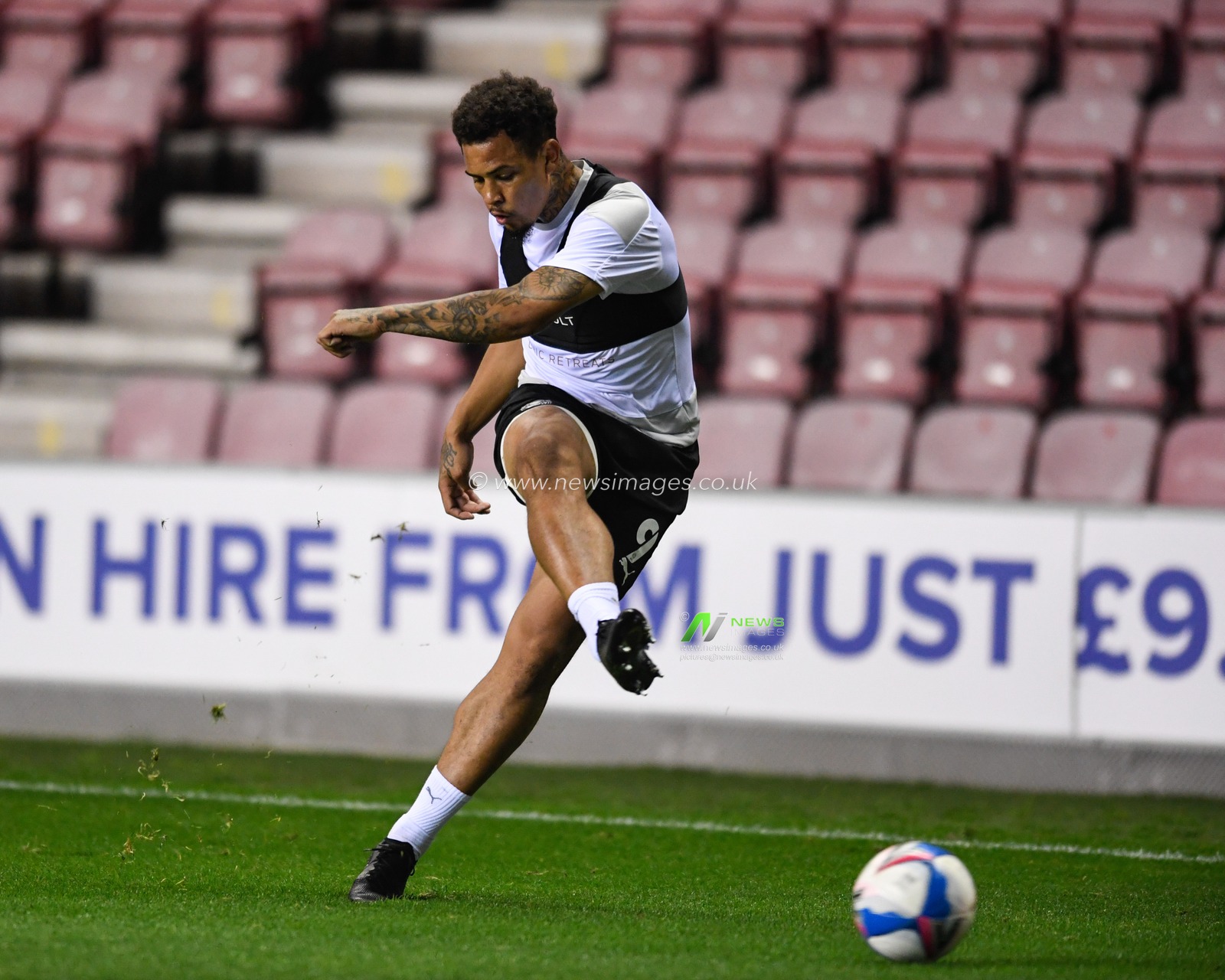 Jonson Clarke-Harris (9) of Peterborough United warming up before the game