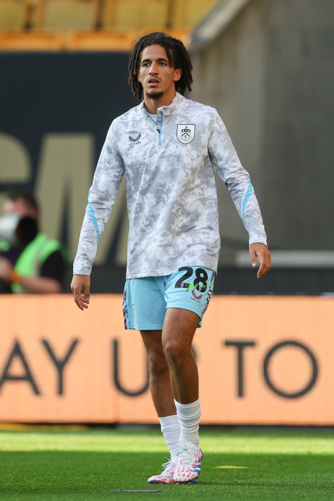 Hannibal Mejbri of Burnley warms up ahead of the Carabao Cup match Wolverhampton Wanderers vs Burnley at Molineux, Wolverhampton, United Kingdom, 28th August 2024

(Photo by Gareth Evans/News Images)
