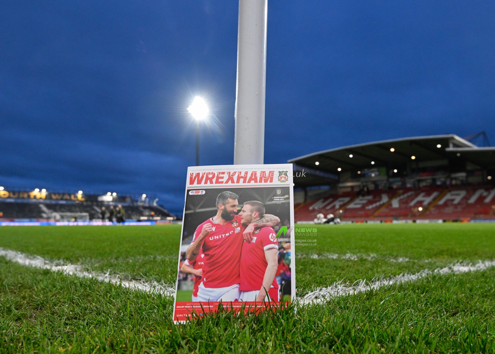 Ollie Palmer of Wrexham and Paul Mullin of Wrexham on the cover of the match day program pitch side ahead of the match, during the Sky Bet League 2 match Wrexham vs Harrogate Town at SToK Cae Ras, Wrexham, United Kingdom, 12th March 2024

(Photo by Cody Froggatt/News Images)