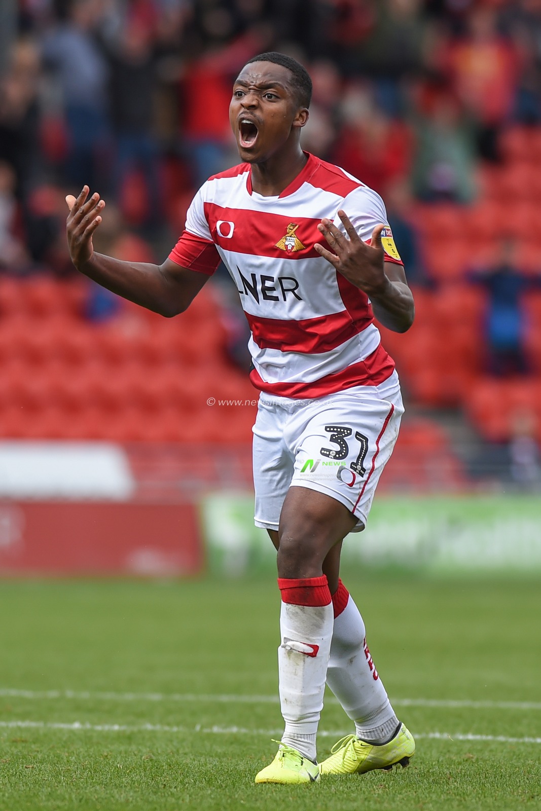 7th September 2019, Keepmoat Stadium, Doncaster, England; Sky Bet League One Football, Doncaster Rovers vs Rotherham United ; Niall Ennis (31) of Doncaster Rovers of celebrates winnning a penalty.
Credit: Dean Williams/News Images

English Football League images are subject to DataCo Licence