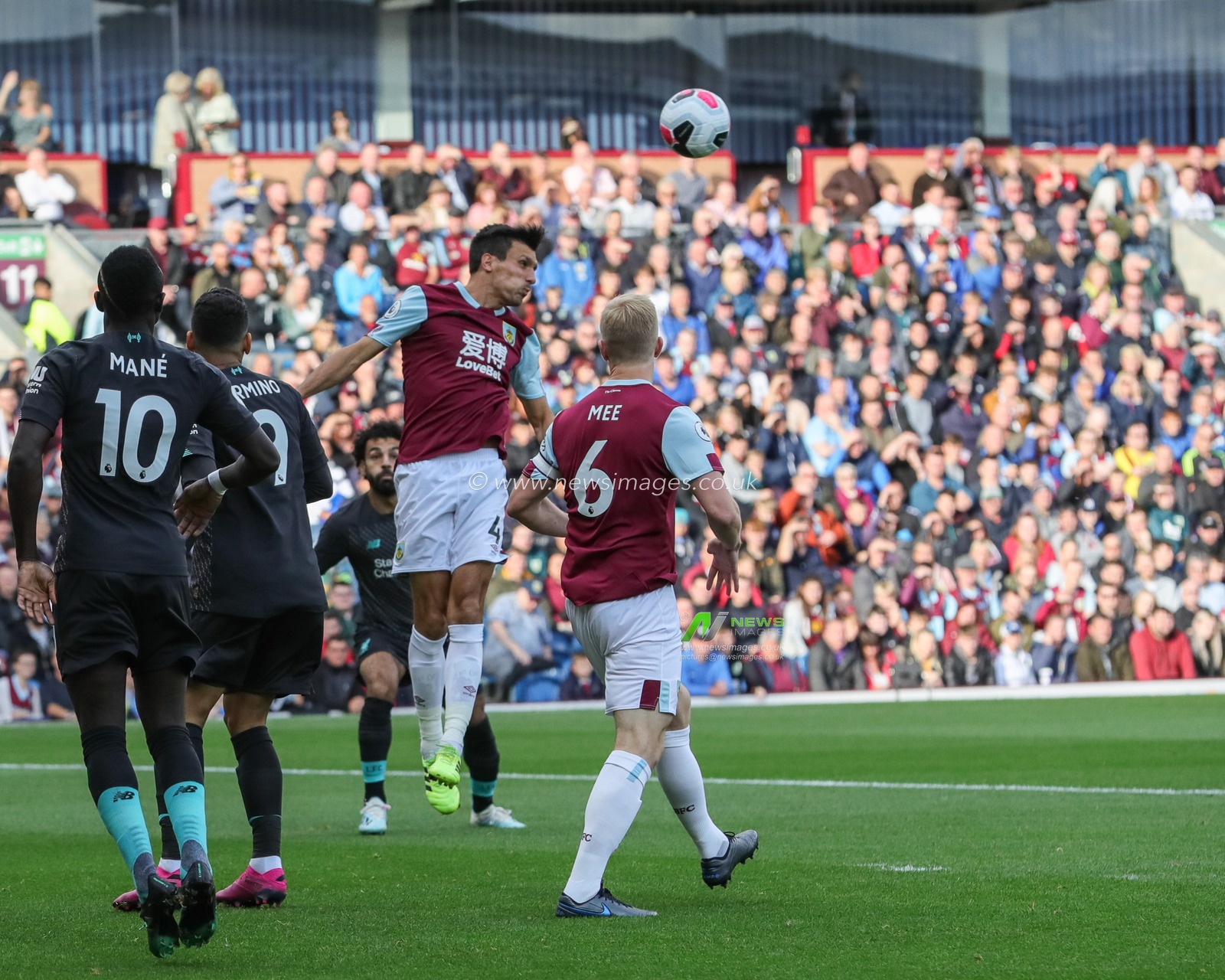 31st August 2019, Turf Moor, Burnley, England ; Premier League Football, Burnley vs Liverpool : Jack Cork (4) of Burnley heads clear 

Credit: Mark Cosgrove/News Images

English Football League images are subject to DataCo Licence