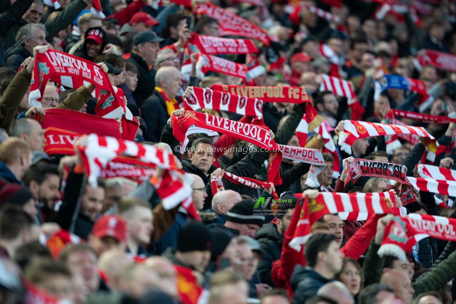 Fans holds  scarfs above their heads

9th April 2019 , Anfield Stadium, Liverpool, England;  EUFA Champions League Quarter Final, First Leg, Liverpool FC vs FC Porto 

Credit: Terry Donnelly/News Images