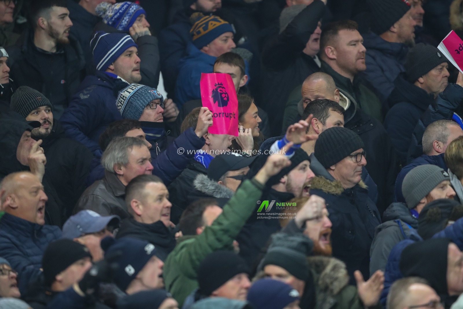 Everton fans holding up Premier League corrupt posters during the Premier League match Nottingham Forest vs Everton at City Ground, Nottingham, United Kingdom, 2nd December 2023

(Photo by Gareth Evans/News Images)