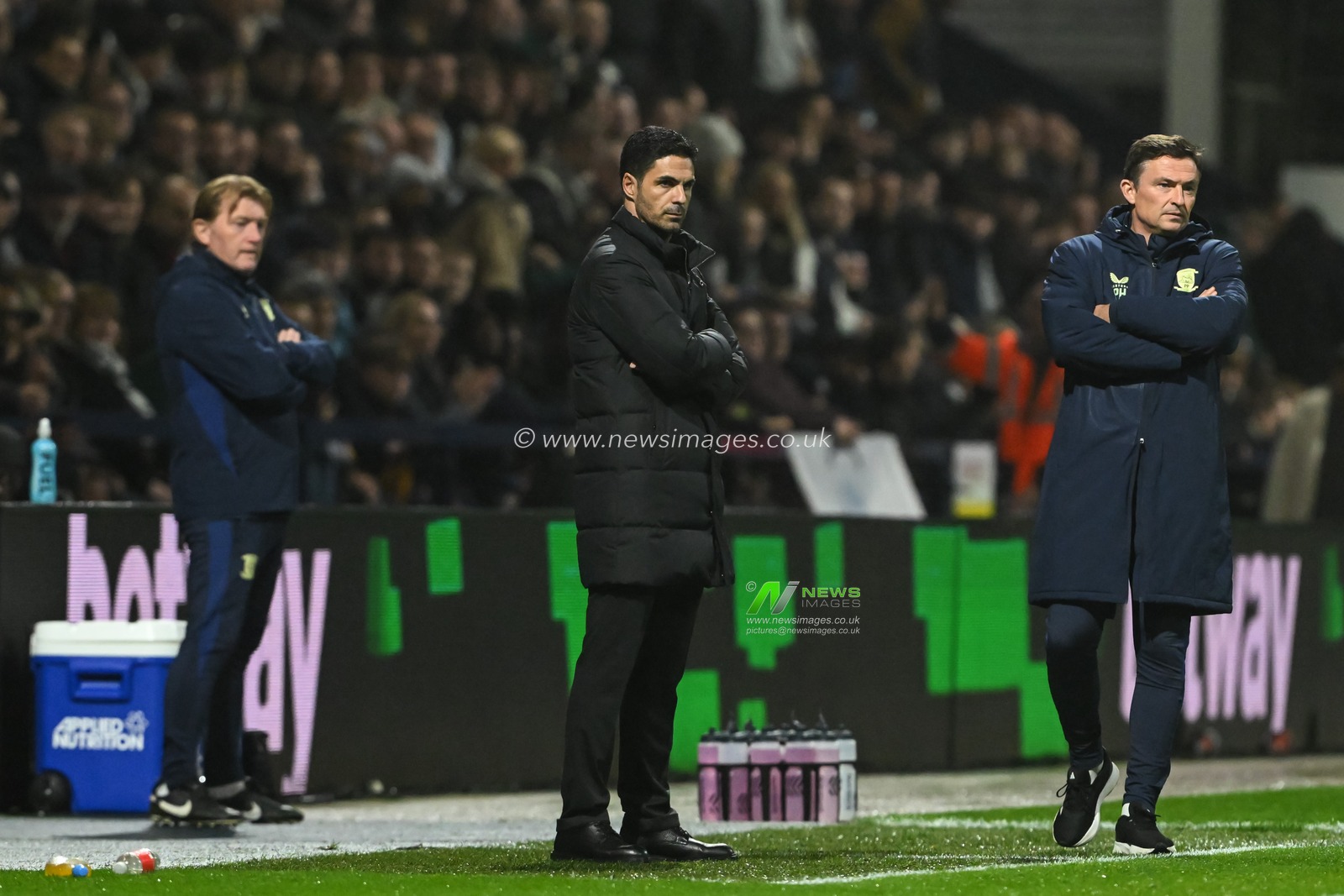 Mikel Arteta manager of Arsenal (center) and Paul Heckingbottom manager of Preston North End (right) watch on during the Carabao Cup Last 16 match Preston North End vs Arsenal at Deepdale, Preston, United Kingdom, 30th October 2024

(Photo by Cody Froggatt/News Images)