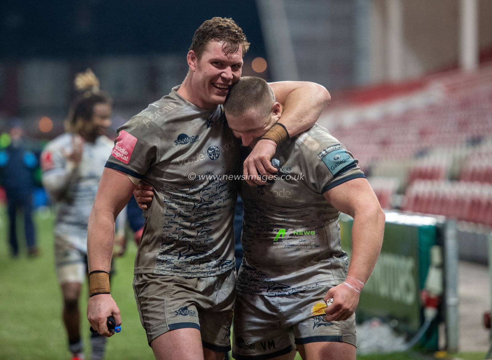 COBUS WIESE #4 of Sale Sharks and VALERY MOROZOV #17 of Sale Sharks celebrate after the final whistle.