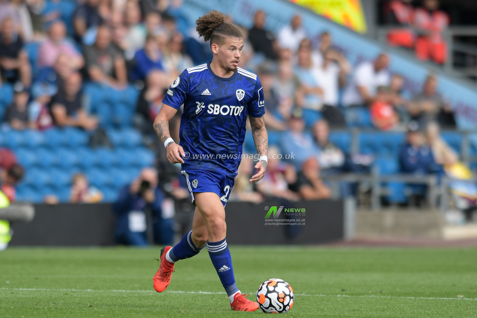 Kalvin Phillips #23 of Leeds United runs with the ball