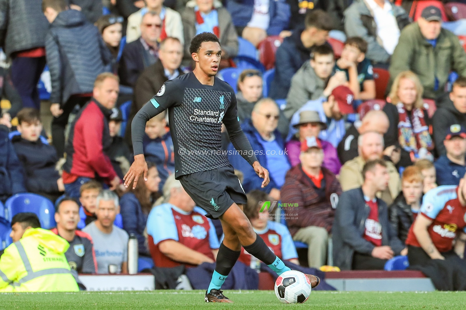 31st August 2019, Turf Moor, Burnley, England ; Premier League Football, Burnley vs Liverpool : Trent Alexander-Arnold (66) of Liverpool with the ball 

Credit: Mark Cosgrove/News Images

English Football League images are subject to DataCo Licence