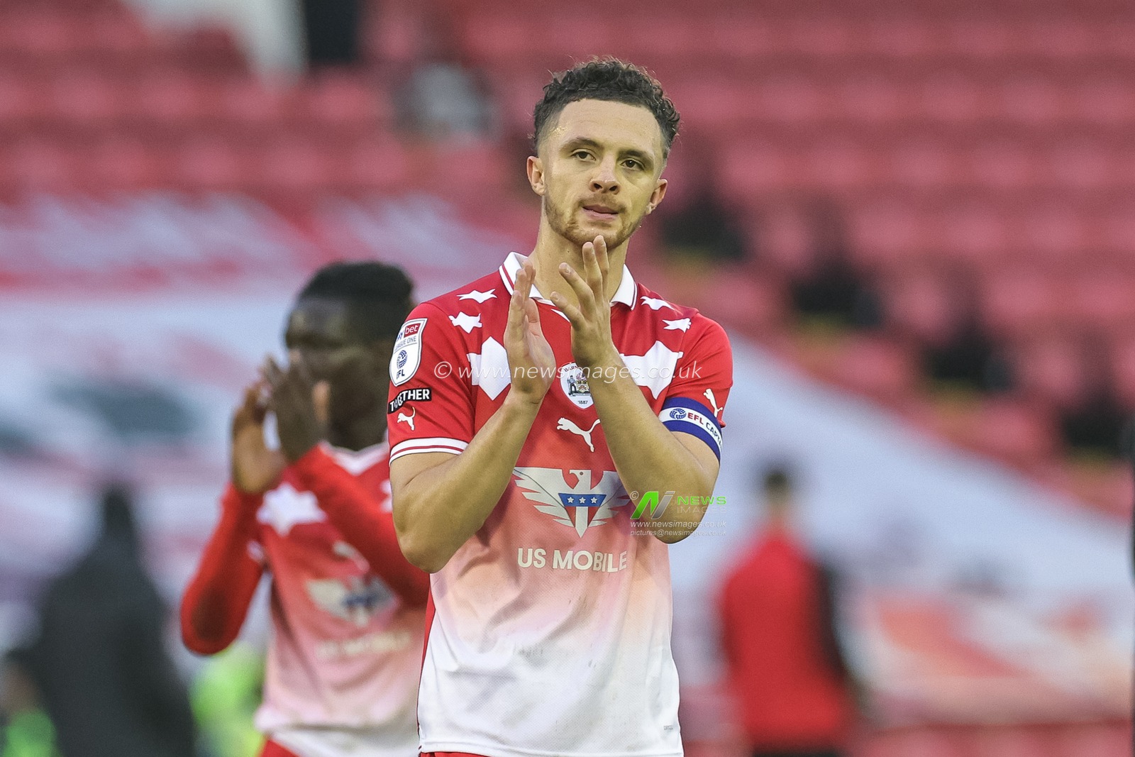 Jordan Williams #2 of Barnsley applauds the home fans during the Sky Bet League 1 match Barnsley vs Fleetwood Town at Oakwell, Barnsley, United Kingdom, 28th October 2023

(Photo by Mark Cosgrove/News Images)