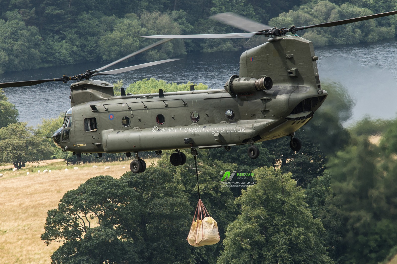 6th August 2019 , Whaley Bridge dam, Whaley Bridge, United Kingdom , Whaley Bridge dam repairs after a heavy flood : A RAF CH-47 Chinook helicopter carries sandbags to Whaley Bridge dam to carry out major emergency repairs after the recent heavy flood waters caused a partial collops of the dam head 

Credit: Kurt Fairhurst/News Images