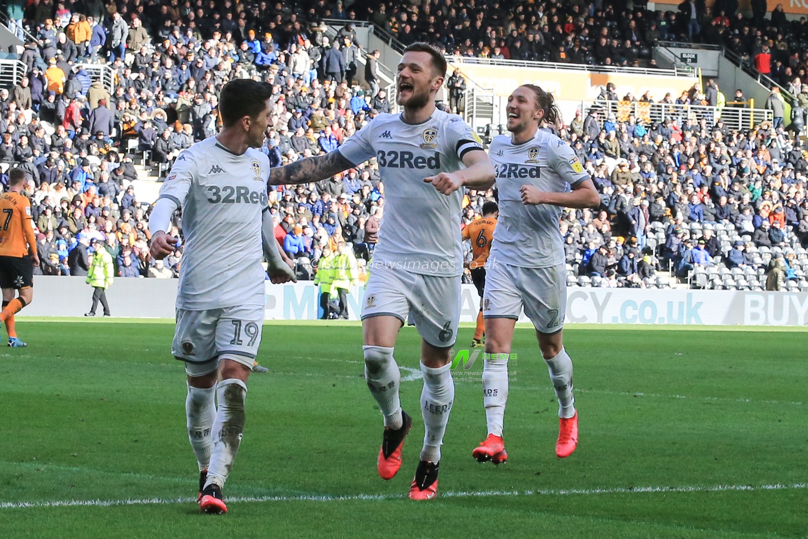 29th February 2020, KCOM Stadium, Hull, England; Sky Bet Championship, Hull City v Leeds United : Liam Cooper (6) runs up the pitch to celebrate Tyler Roberts (11) of Leeds United goal which made it 4 - 0
