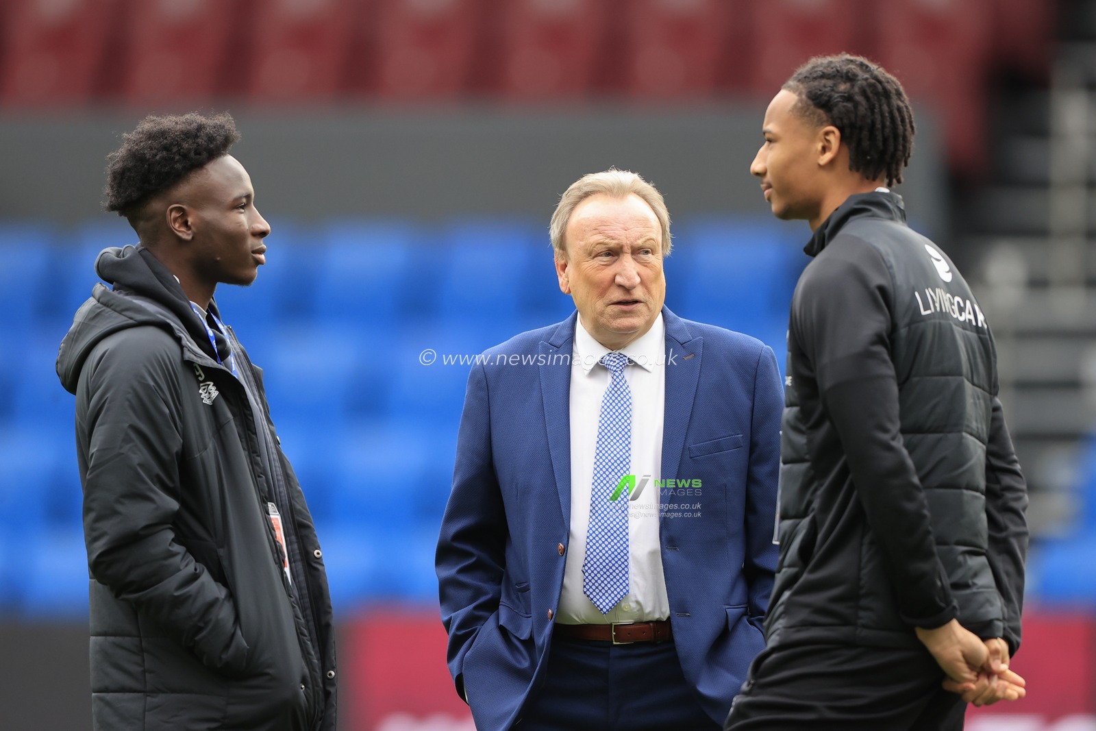 Neil Warnock the Huddersfield Town manager talks to David Kasumu #18 and Brahima Diarra #35 of Huddersfield Town during the pitch inspection ahead of the Sky Bet Championship match Burnley vs Huddersfield Town at Turf Moor, Burnley, United Kingdom, 25th February 2023

(Photo by Conor Molloy/News Images)