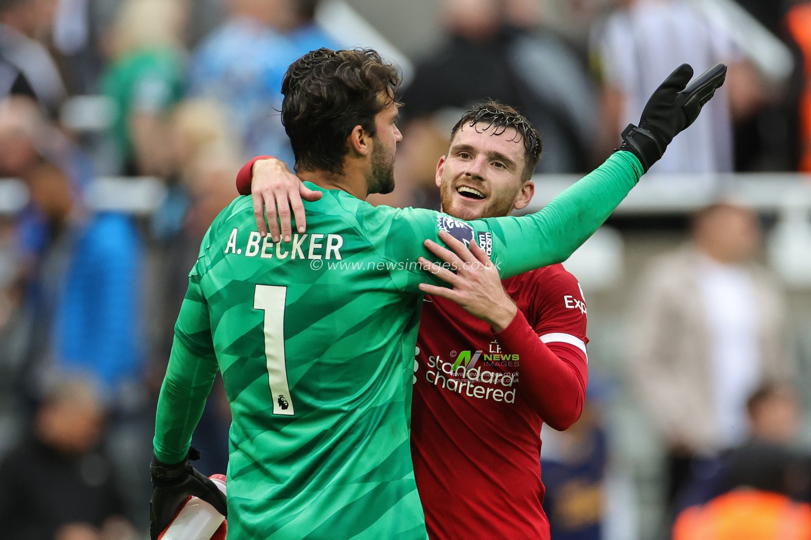 Alisson Becker #1 of Liverpool and Andrew Robertson #26 of Liverpool celebrate the win during the Premier League match Newcastle United vs Liverpool at St. James's Park, Newcastle, United Kingdom, 27th August 2023

(Photo by Mark Cosgrove/News Images)