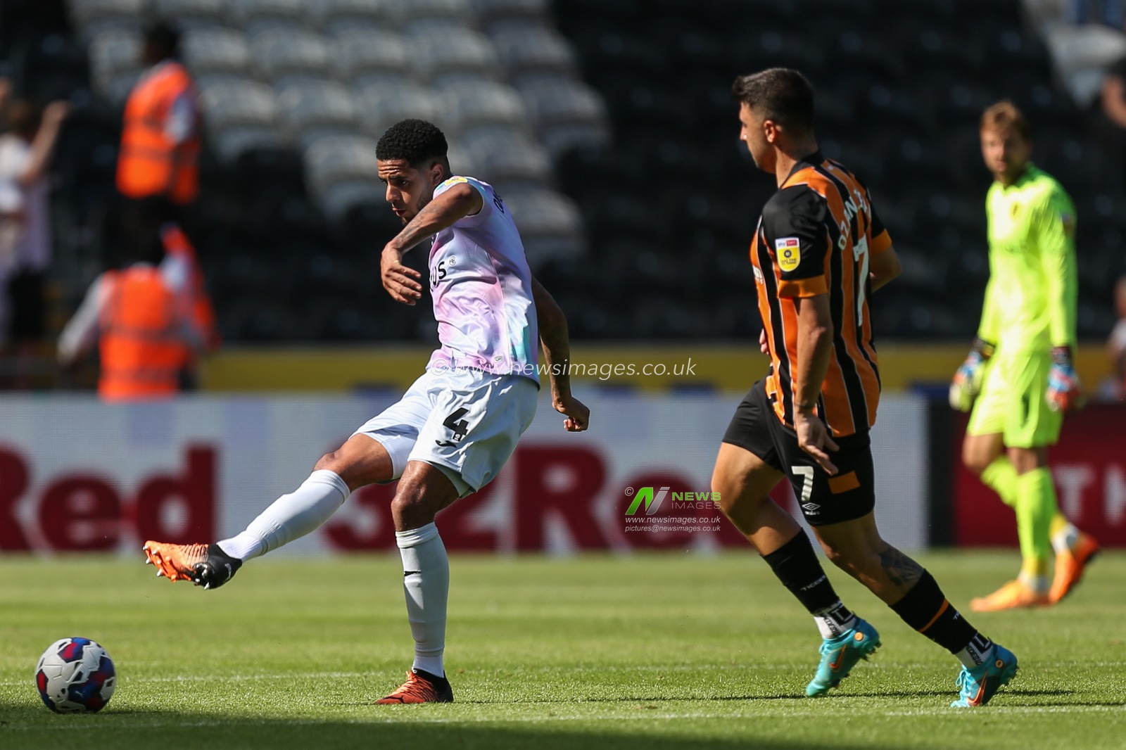 Andrew Omobamidele #4 of Norwich City passes the ball